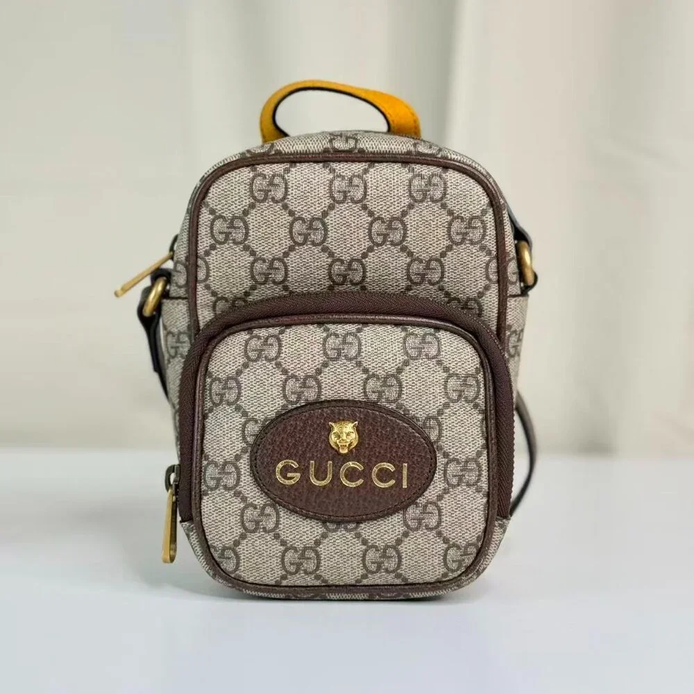 Gucci GG Logo Supreme Vintage Neo Shoulder Bag Crossbody with Gold Lion Emblem